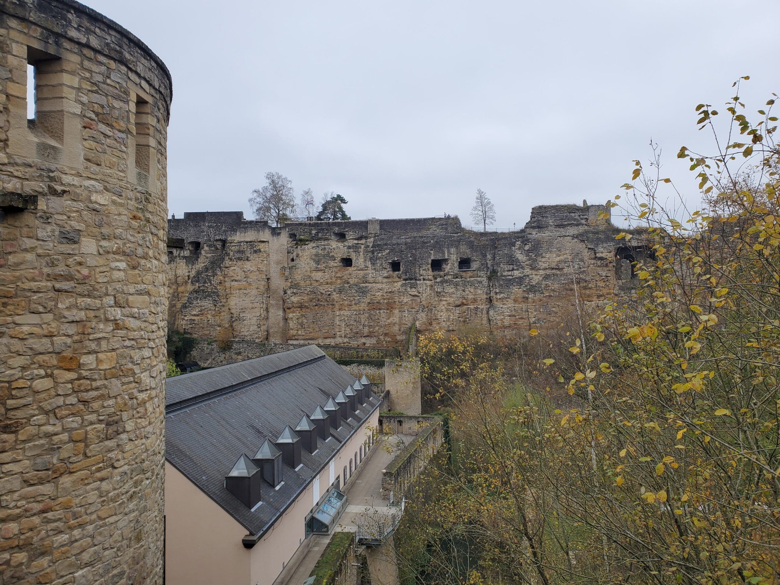 The exterior of the Bock Casemates  A towering rock cliff with holes where they place cannons to defend the old city.