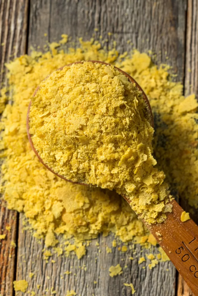 A spoonful of yellow nutritional yeast